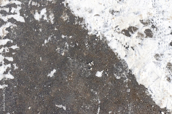 Fototapeta Asphalt texture in snow