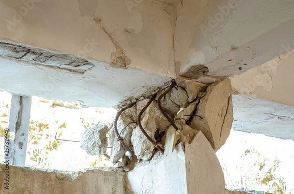 Obraz Imperfections arising from weak constraction, necking weak column areas. can crumble a building