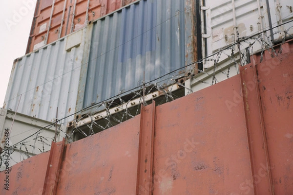 Fototapeta Iron Containers of different colors are in the port