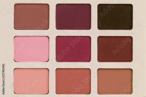 Fototapeta Multicolored cosmetic shadow palette close-up, single object without background