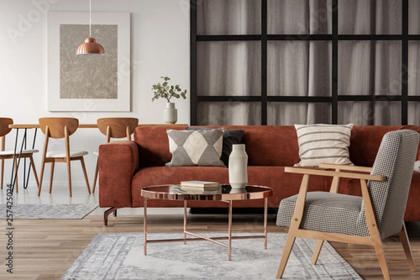 Fototapeta Open plan studio apartment with living and dining area
