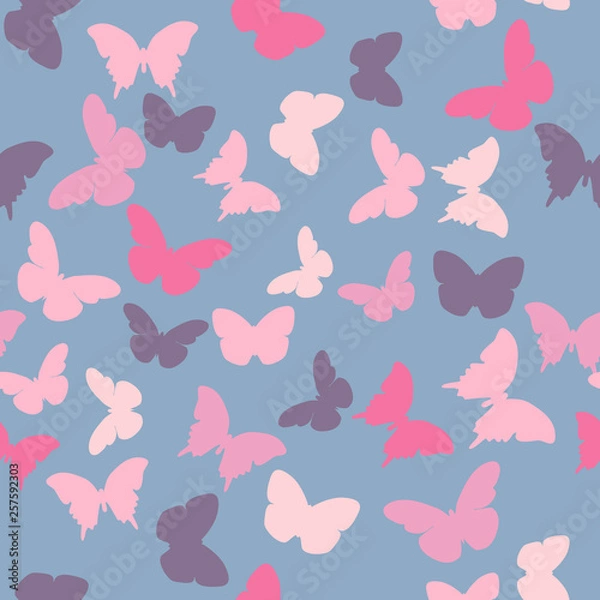 Fototapeta Vector seamless pattern with random violet, pink, creamy butterflies on blue  background. Vintage elegant child baby design for wrapping, textile, fabric, invitation, greeting, websites