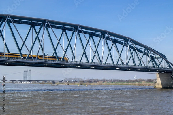 Fototapeta Dutch Train Passing Bridge Nijmegen
