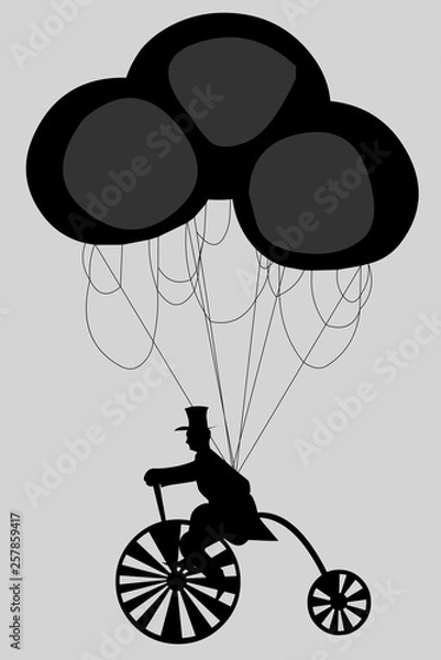 Fototapeta Silhouette of a cyclist with balloons