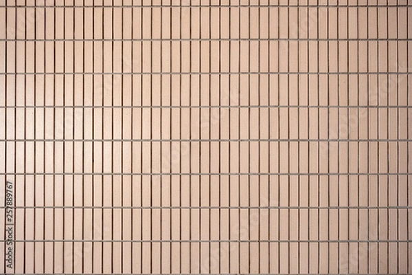 Fototapeta Pattern of vertical Brick wall in light brown color for background