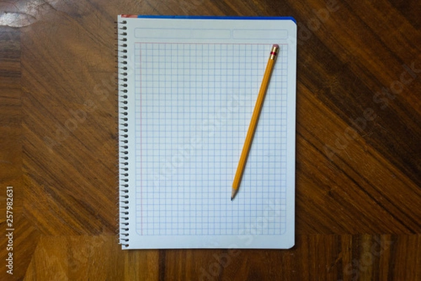 Fototapeta Notebook and pencil.