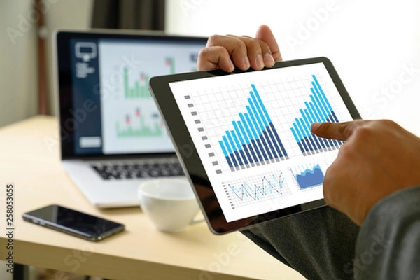 Obraz business man work chart schedule or planning financial report data methodology