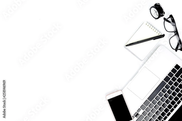 Fototapeta Creative flat lay photo of modern workplace with laptop, top view laptop background and copy space on white background, Above view shot of Computers on white background