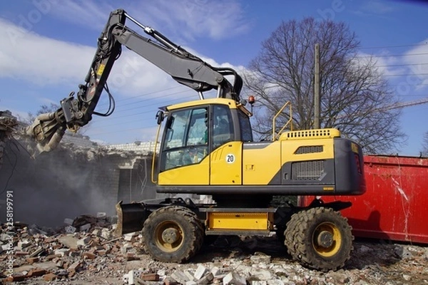 Obraz Radlader beim Abbruch eines Hauses