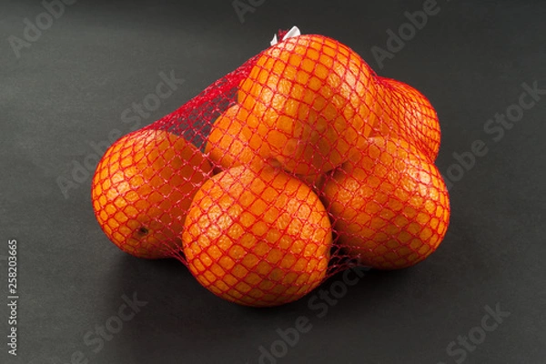 Obraz oranges in bag mesh