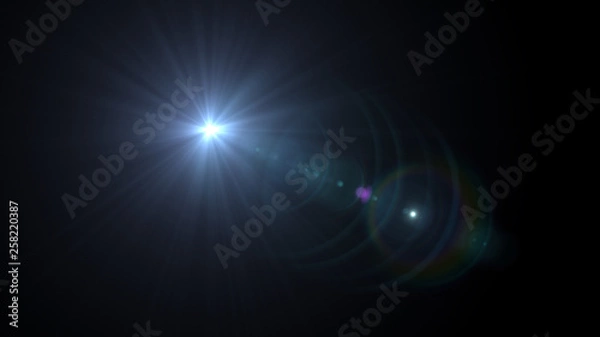 Fototapeta Lens flare glow light effect on black background. Easy to add overlay or screen filter over photos