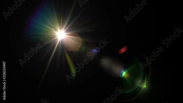 Fototapeta Lens flare glow light effect on black background. Easy to add overlay or screen filter over photos
