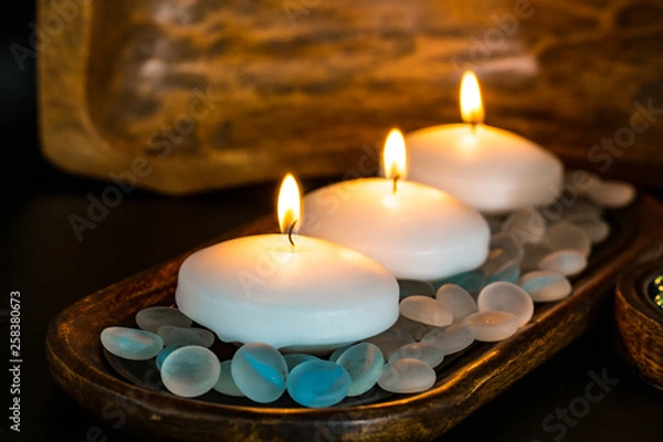 Obraz candles on black background