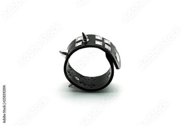 Obraz Rock bracelet with silver spikes isolated on white background with empty space for text. Accessory for punk, metal and gothic style.