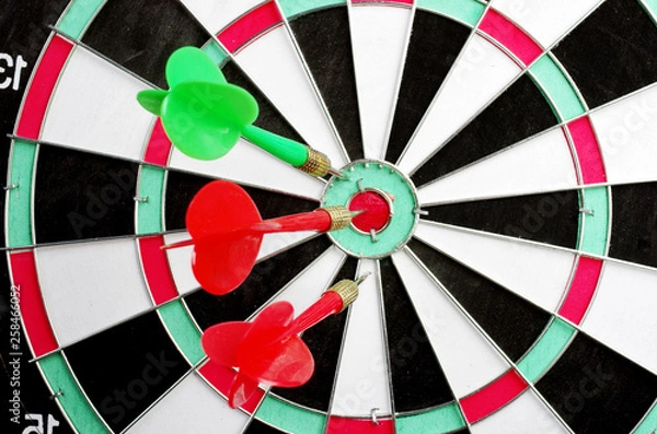 Obraz Target and darts arrows hitting the target