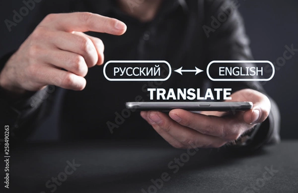 Obraz Man holding smartphone. Translate concept