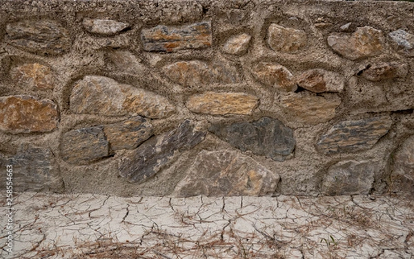 Fototapeta Stone wall texture. Rock and stone wall pattern