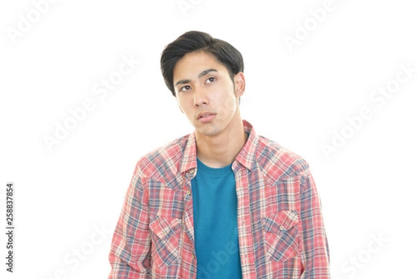 Fototapeta 疲れた表情の男性