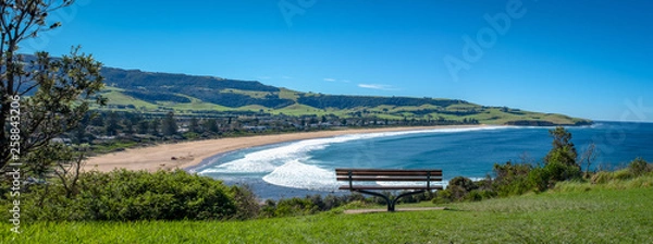 Obraz A restful bench with a panoramic view of Werri Beach, Gerringong, New South Wales, NSW, Australia