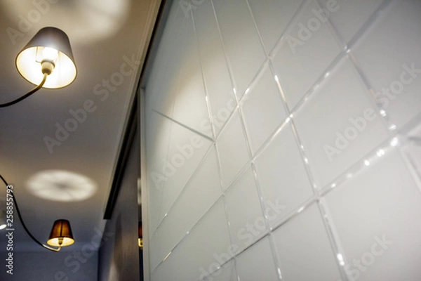 Fototapeta Modern house interior decor elements of the living room and segments of the luxury environment of an empty apartment