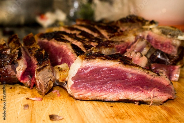 Obraz Florentine steak, t-bone steak on wooden cutting board