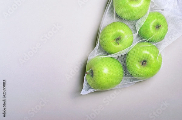 Fototapeta Apples in Mesh Bag, Eco Friendly Bag, Zero Waste Concept