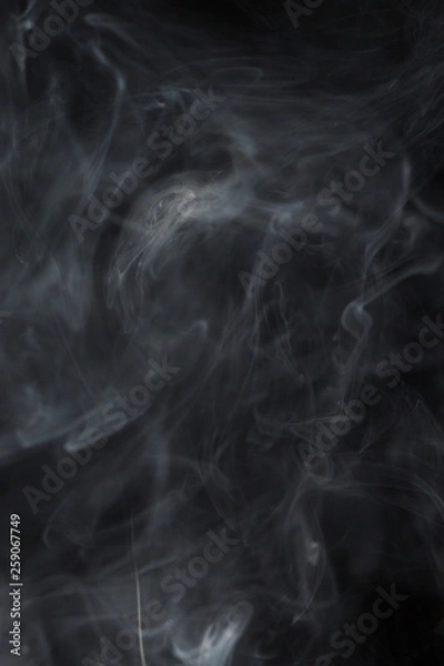 Obraz Abstract white smoke on black background