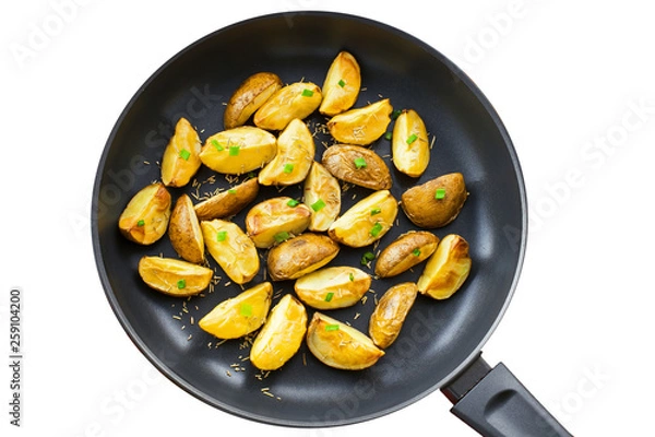 Obraz Fresh fried potato wedges with rosemary and spring onion on a pan, isolatedon white background, top view close-up shot