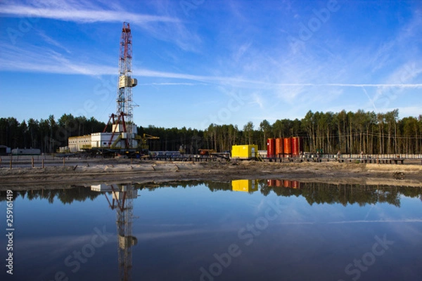 Obraz reflection in the water rig in the morning sun in the forest