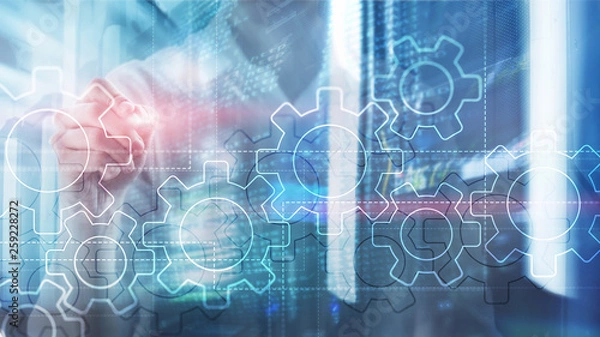 Fototapeta Double exposure gears mechanism on blurred background. Business and industrial process automation concept.