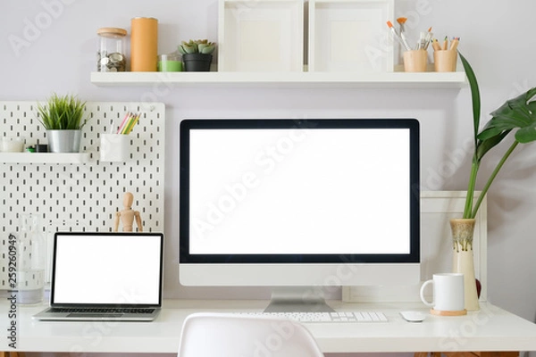 Fototapeta Modern clean workspace mockup with blank screen desktop computer.