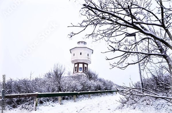 Obraz Lighthouse in a snowy day
