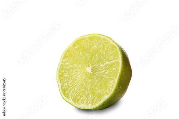 Fototapeta half cut lime isolated on white background with clipping path and copy space for your text