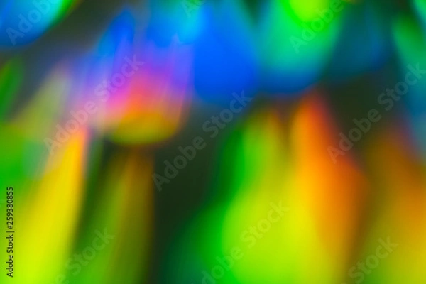 Fototapeta Blurry lights background. Defocused lens flare glow. Abstract illuminated bokeh design.