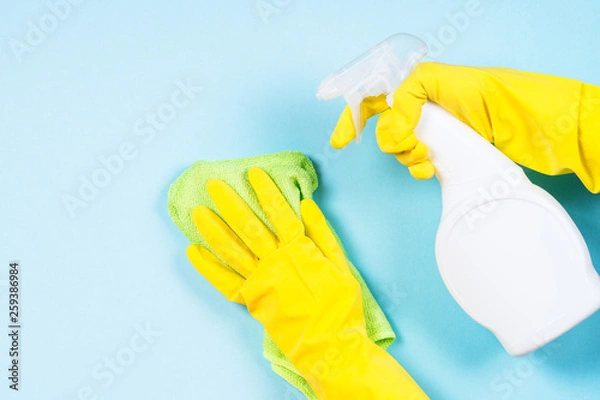 Obraz Cleaning concept on blue background.