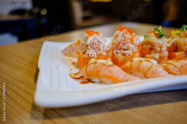 Obraz Salmon Sushi is a popular Japanese food. Served in a white plate