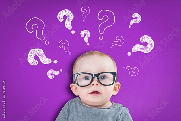 Fototapeta thinking baby with question marks on  background