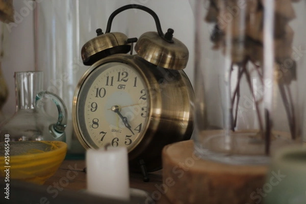 Obraz old alarm clock on table