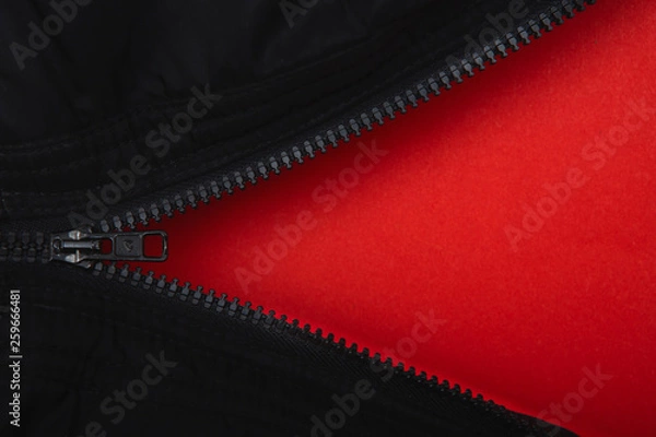 Obraz zipper, lock on clothesred on red background