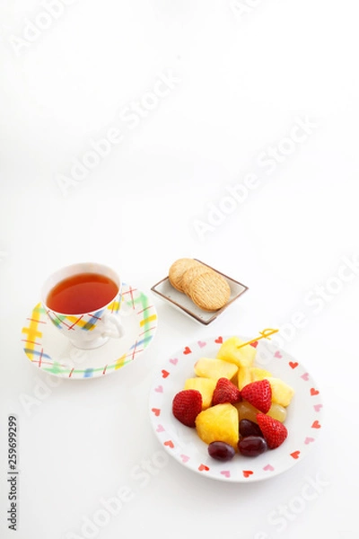 Fototapeta 一杯の紅茶とフルーツ