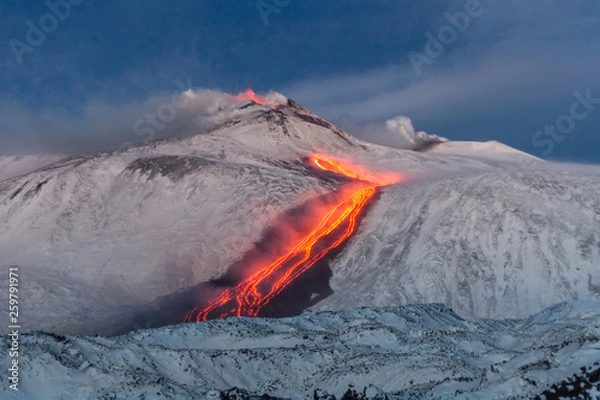 Obraz Etna volcano - lava flows and strombolian explosions from Southeast Crater - Snow landscape