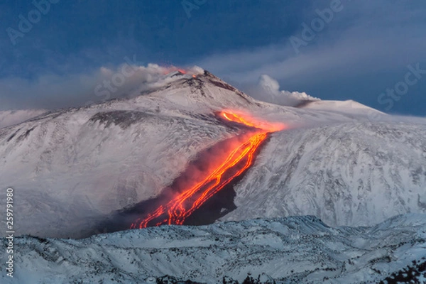 Obraz Etna volcano - lava flows and strombolian explosions from Southeast Crater - Snow landscape