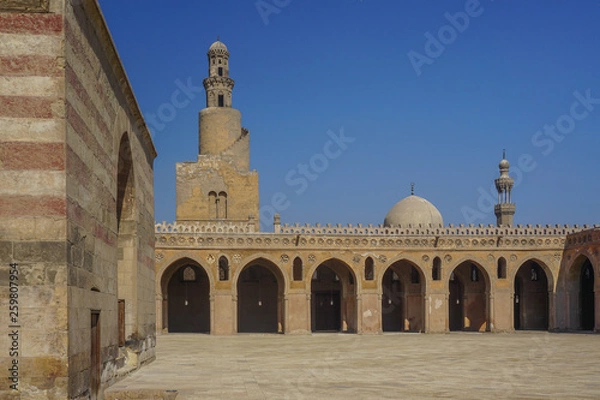 Fototapeta Cairo, Egypt: The minaret of the Mosque of Ibn Tulun (879 AD) -- the oldest in Cairo surviving in its original form and the largest in land area.