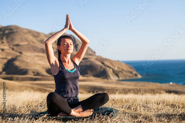 Fototapeta sunset yoga classes.