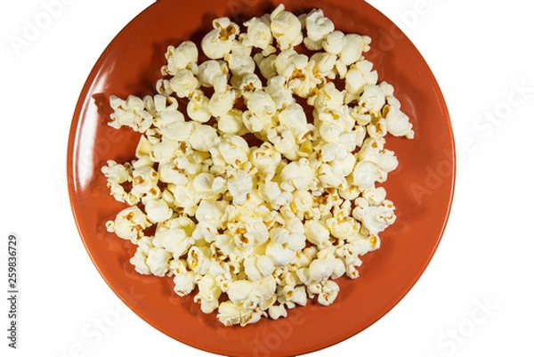 Obraz Popcorn in a plate on isolated background