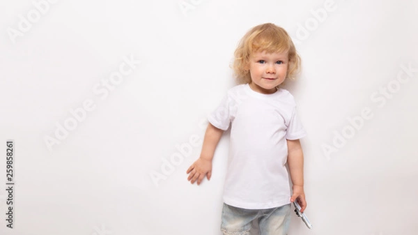 Obraz banner child playing with toy airplane against on a white background. concept dreams of flight