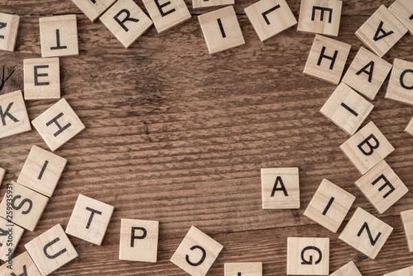 Obraz alphabets on wooden cubes as a background