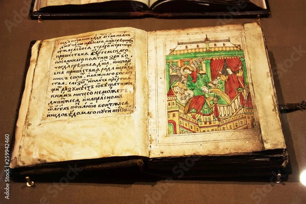 Fototapeta Open old christian book in the Ipatievsky Monastery. Kostroma, Russia. May, 2013.