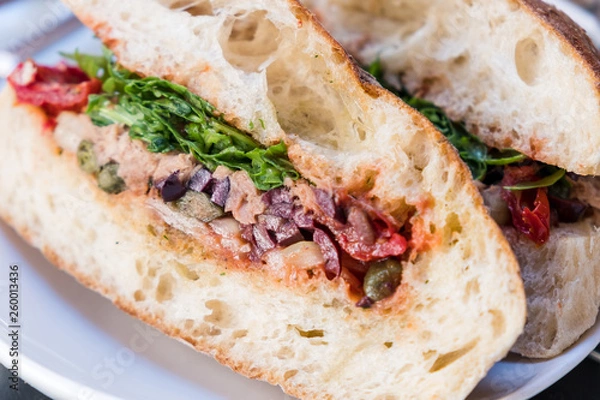 Fototapeta Healthy sandwiches with tuna and raw spring or summer mediterranean vegetables