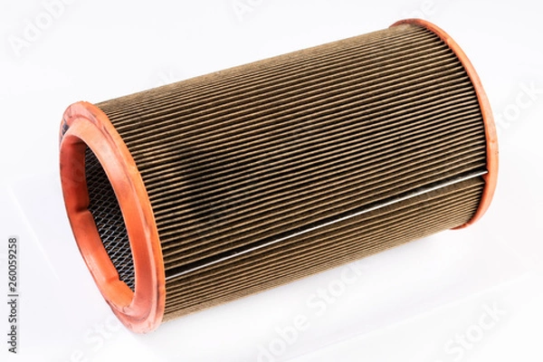 Obraz Used car air filter above white background. Car concept repaires.